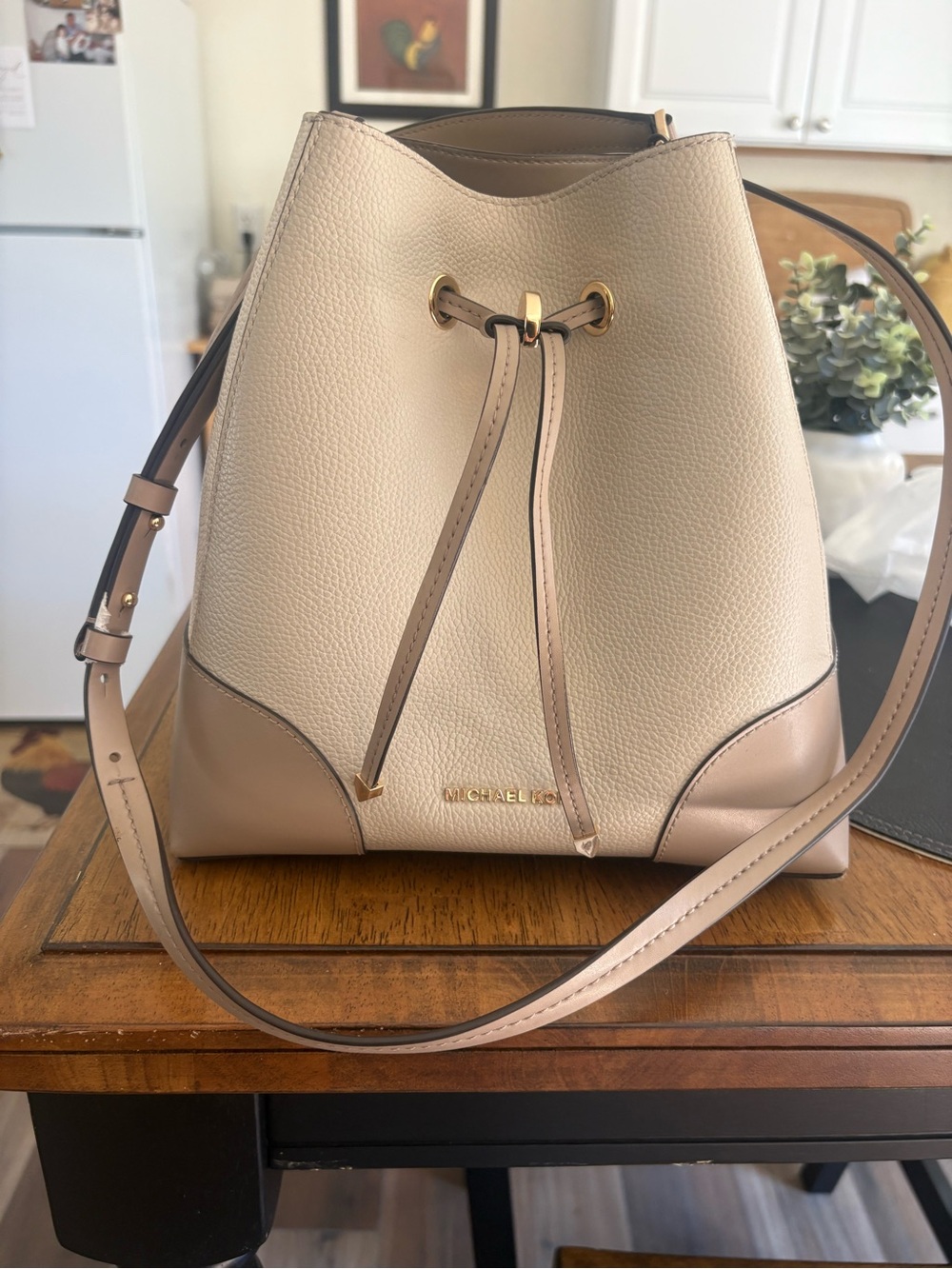 Michael Kors Cream and Tan Pebbled Leather Drawstring Bucket Bag like new